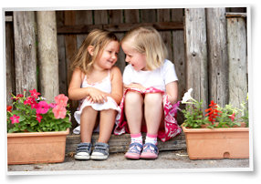 Preschool girls talking and interacting with each other